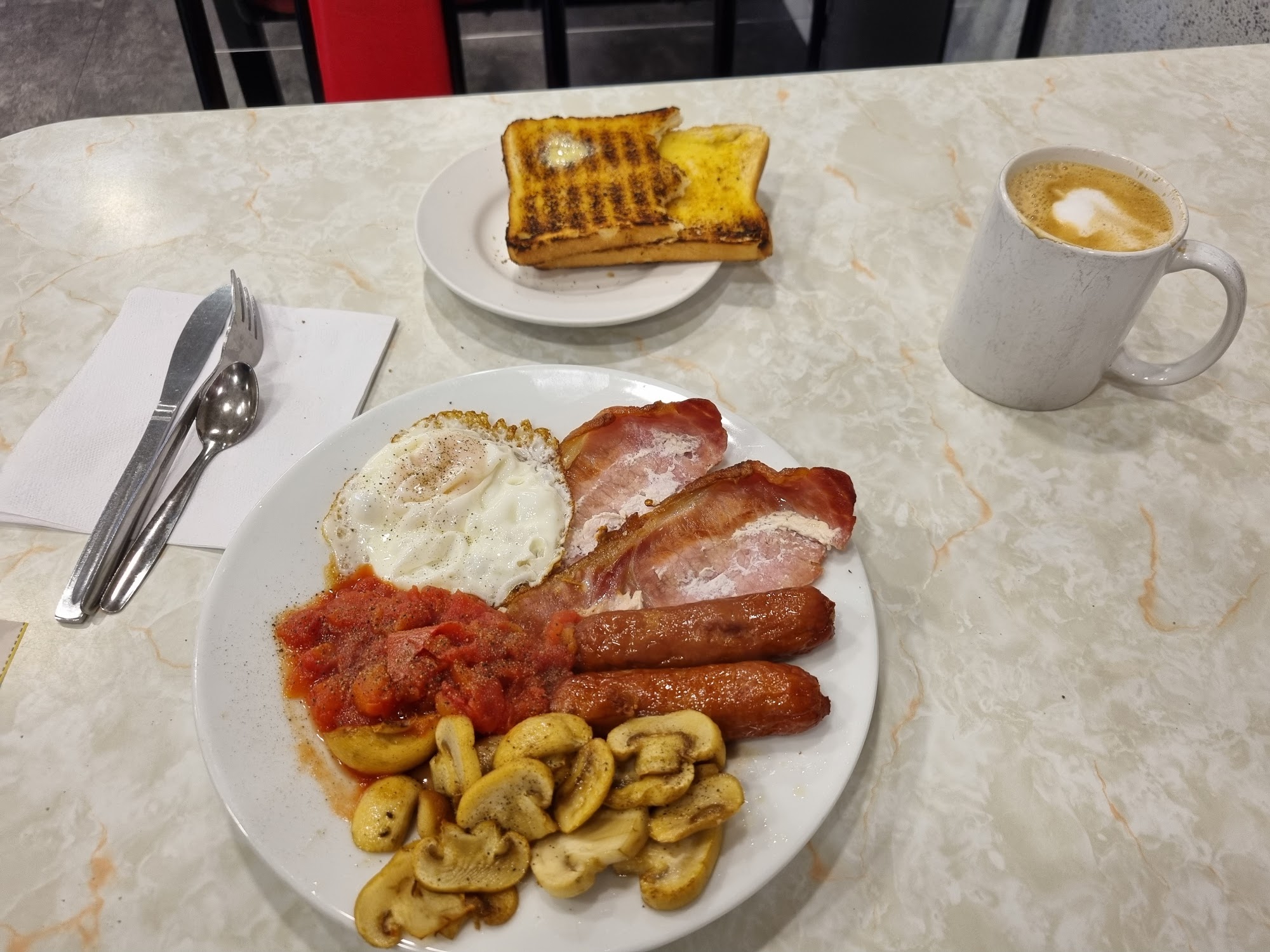 Phil's News & Cafe / The Tasty Plaice