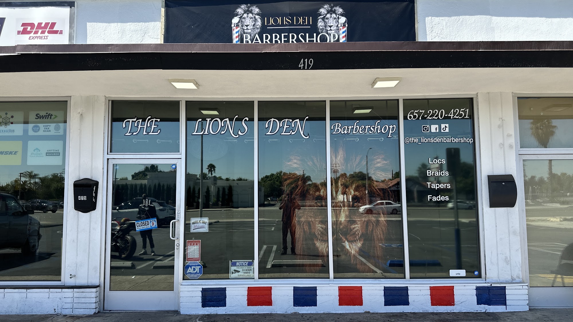 The Lions Den Barbershop